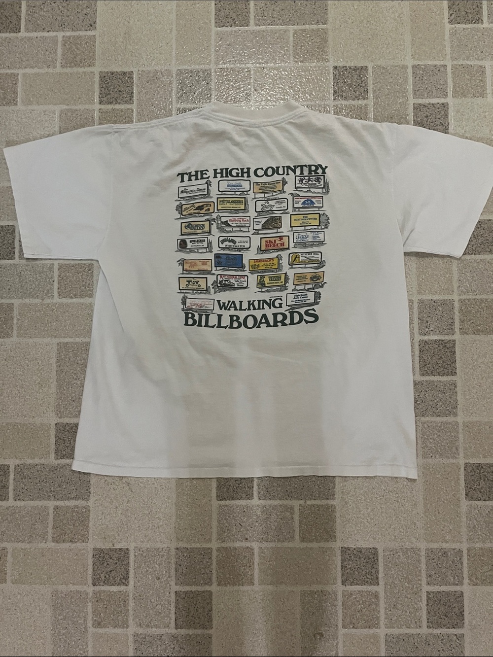 Vintage Jensen White Short-Sleeve Crewneck T-Shirt with Chest Logo. Blowing rock